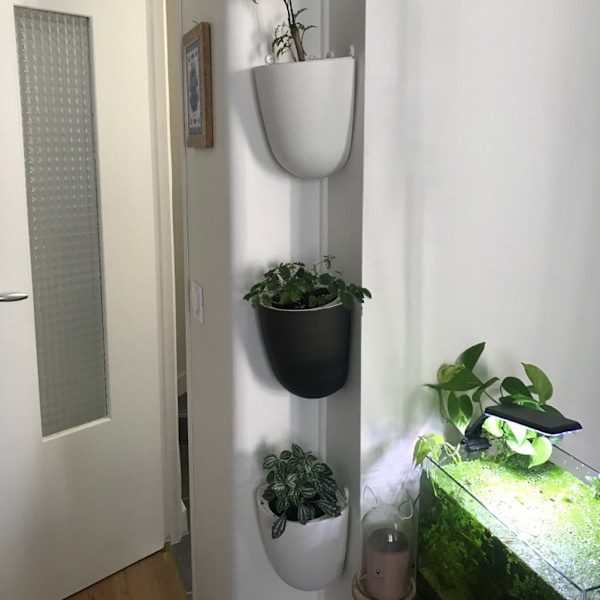 Hörnväggmonterad blomkruka Självbevattnande blomkruka Plastkruka