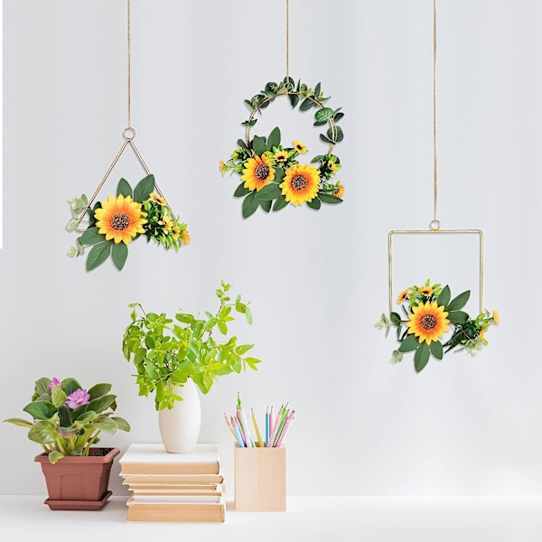 Konstgjord solros/rosbågekrans, set med 3 hängande blommor
