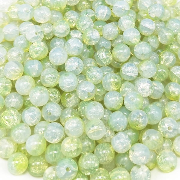 Ett paket färgat glas spruckna jadepärlor 8mm i olika