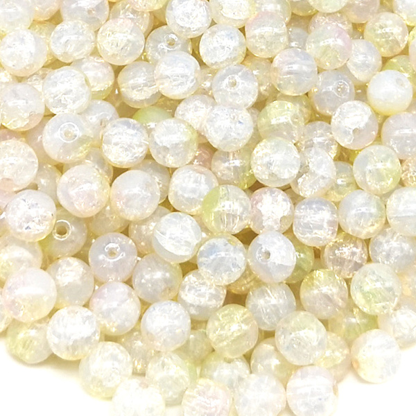 Ett paket färgade glaspärlor i sprickad jade 8mm i olika