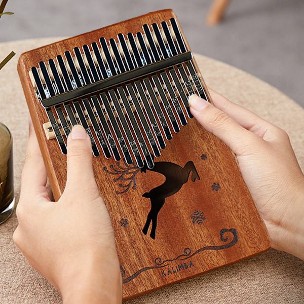 17-tangenters kalimba tommelfingerklaver; stemmehammer, fingerdæksler, tangent