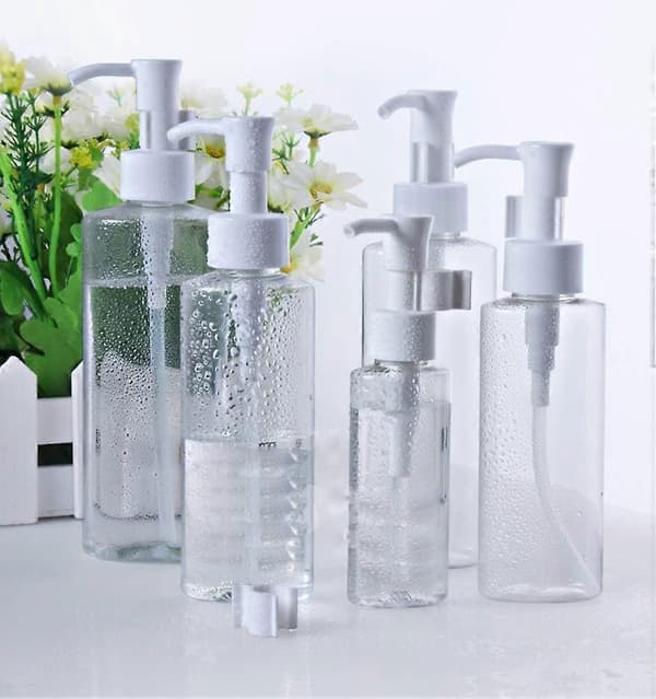 Klara plastflaskor med pump, 100 ml påfyllningsbara dispensrar, set om 3, perfekt för resor