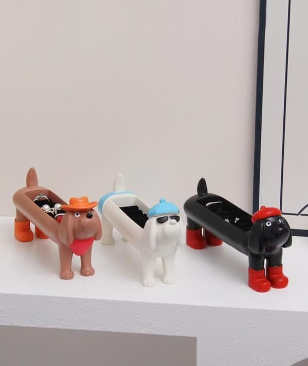 Sød gravhundformet opbevaringsboks i harpiks (sort).
