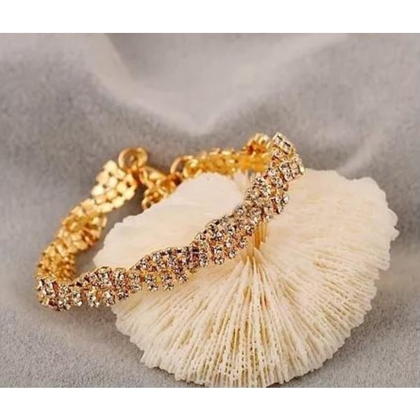 Glittrigt Strass Guld Armband fyllt med Vita Rhinestones Guld