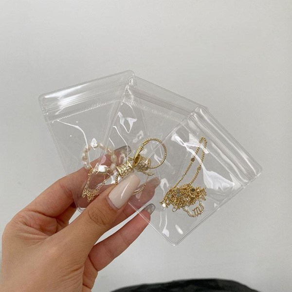 Smykkeopbevaring - Ringbind Transparent