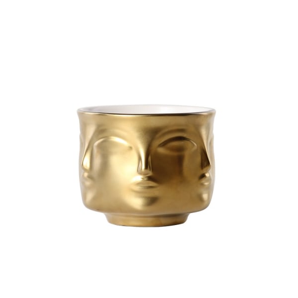 Dekorativ keramikskål i guld med ansigtsmønster, smykkeholder og nøgleholder, vase til stueindretning