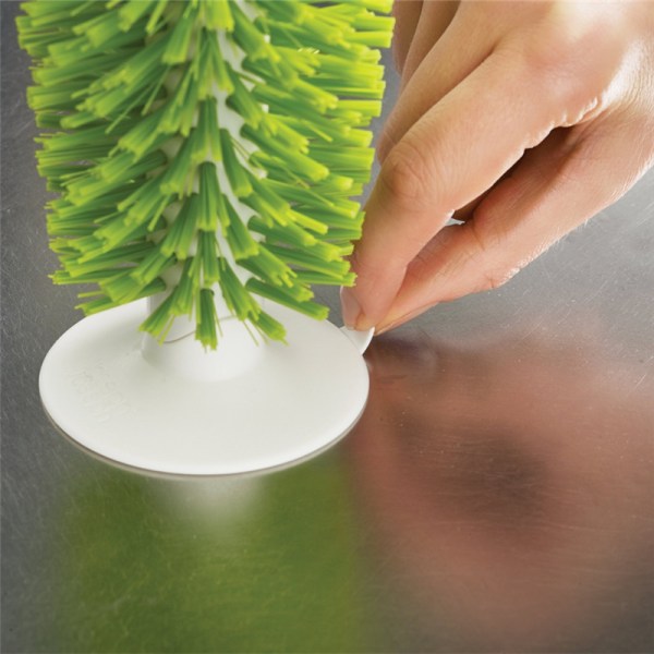 Børstet glassbørste med vertikale sugekoppholdere i vasken, børster for rengjøring av kjøkkenflasker, grønn