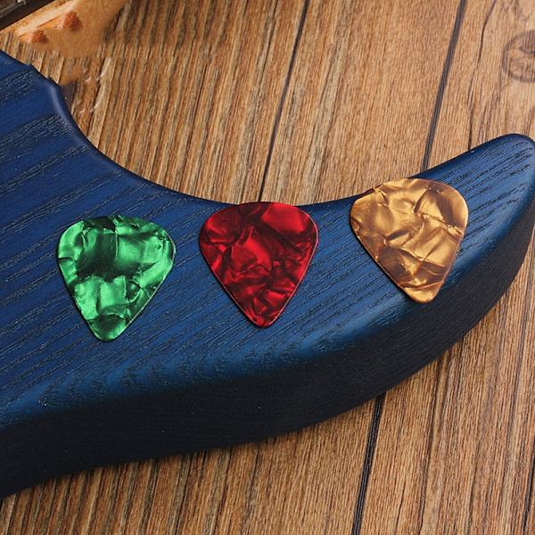 Plektrum 10 st/förpackning Färgglada Celluloidgitarrplock för Akustiska Gitarrer Plock-0,46 mm-Slumpmässig Färg