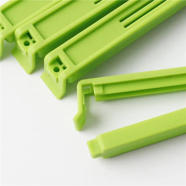 4 st Plastpåse-klämmor för Matpaket, Böjd Design Tätningsklämmor för Mat, Kök och Hem (2,9 tum)4