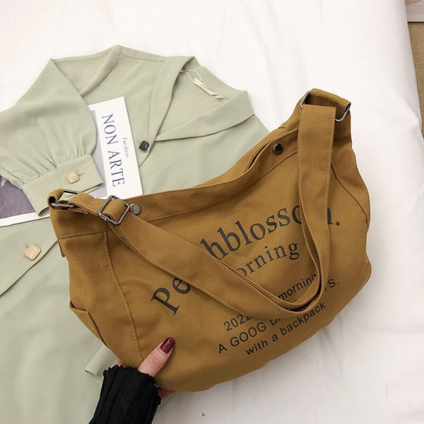 Alphabet Canvas Bag Mode mångsidig väska Stor kapacitet Messenger Bag Khaki