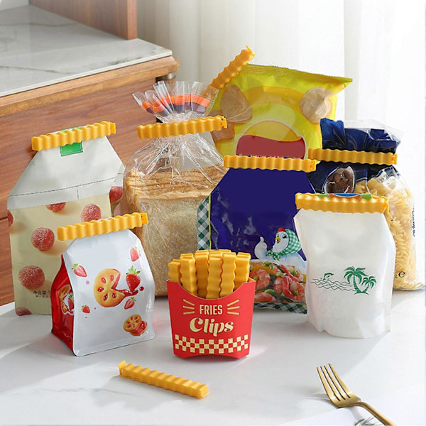 1 Set Påsförslutningsklämmor med Förvaringslåda Återanvändbara Friterade Chips Form Design Snackspåsklämmor Matförslutare Köksartiklar