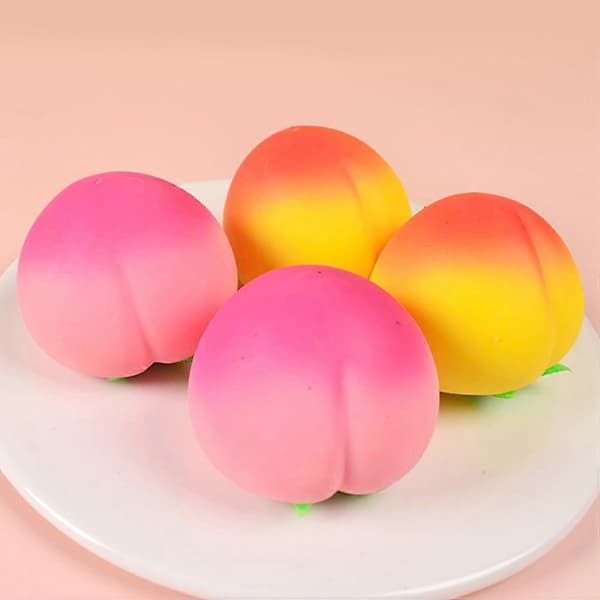 2 st Persikoformade Stressbollar Simuleringsfruktformade Stressleksaker Stretchiga Dekompressionsleksaker