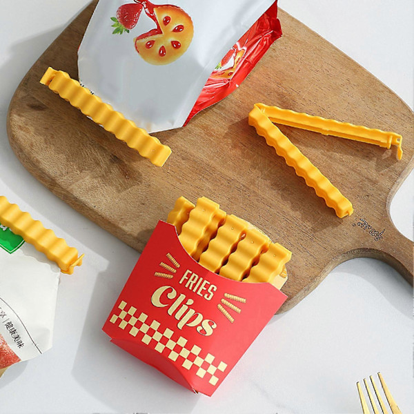 1 Set Påsförslutningsklämmor med Förvaringslåda Återanvändbara Friterade Chips Form Design Snackspåsklämmor Matförslutare Köksartiklar