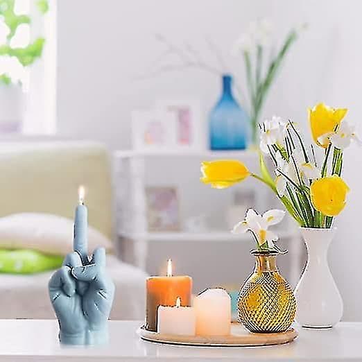 Kreative duftlys formet som en langfingergest blue