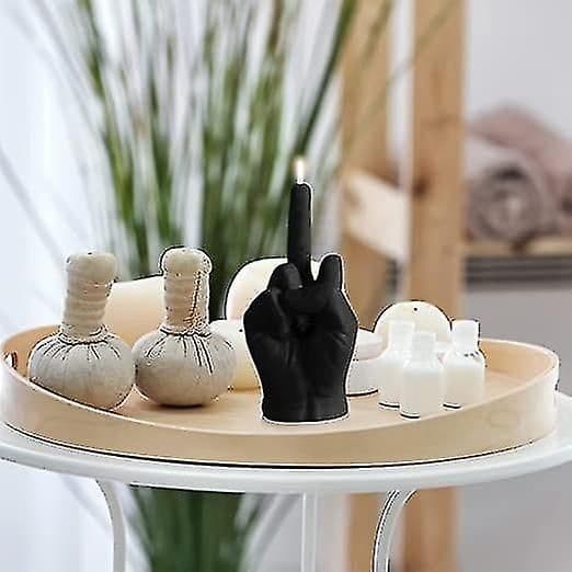 Kreative duftlys formet som en langfingergest black