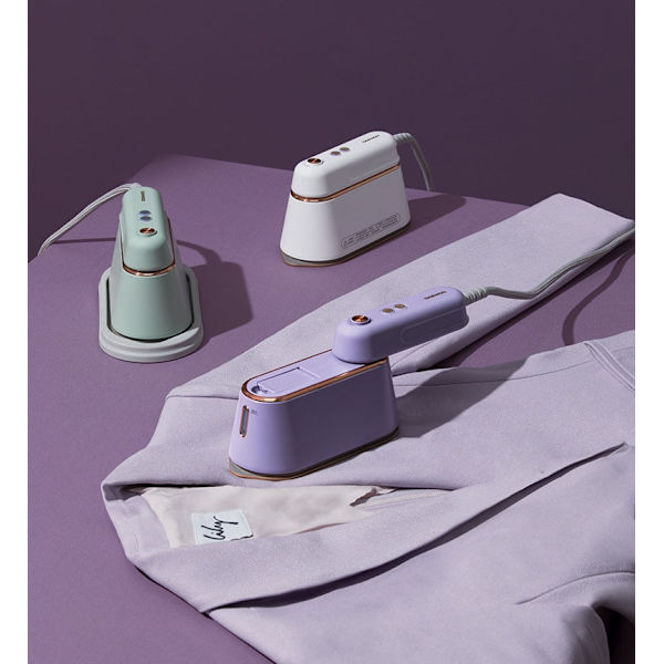 Handhållen ångstrykjärn Plaggstrykjärn Hemstrykjärn purple