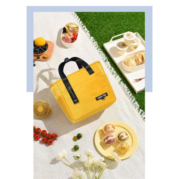 Eristetyt Bento-lounaslaukut suuren kapasiteetin vetoketjulla yellow 27*15*28cm