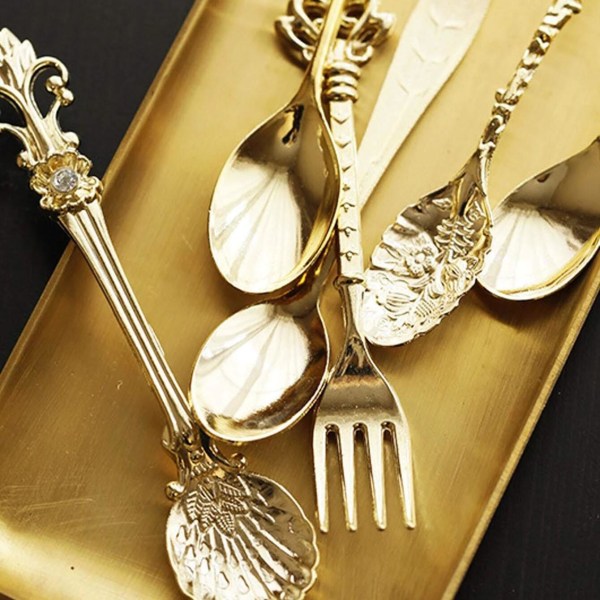 Lyxiga dessertbestick i guld - 5 skedar & 1 gaffel Guld