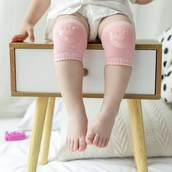 Skydda ditt barns knän med mjuka knäskydd i rosa spandex Rosa