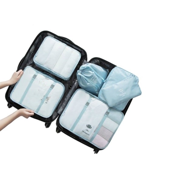Organisera packning med Packningskuber & Påsar Set Ljusblå