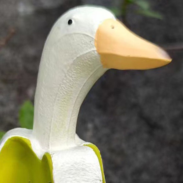 Luova banaani ankan patsas, puutarhan koristelu, kodin pöydän koristelu