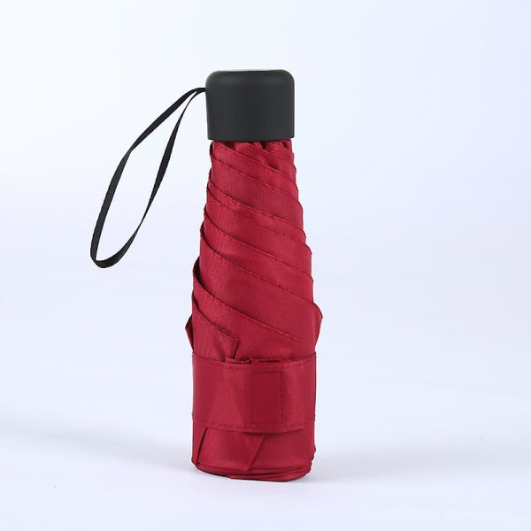 Mini reseparaply, kompakt hopfällbart paraply, litet lätt vattentätt paraply, regn- och solparaply för kvinnor män och barn (1st, röd)