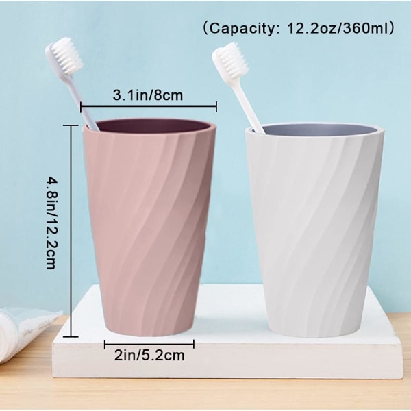 Packa okrossbara toaletttandborstkoppar, mjuka och hållbara, tandborstglas för badrum (vita och rosa)