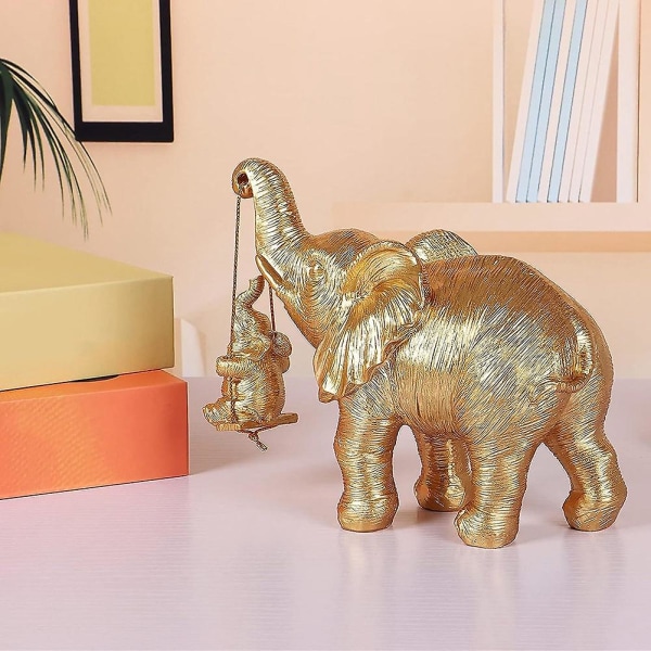 Elefant statue. Guld elefantindretning bringer godt, sundhed, styrke elefantgaver, dekorationsapp