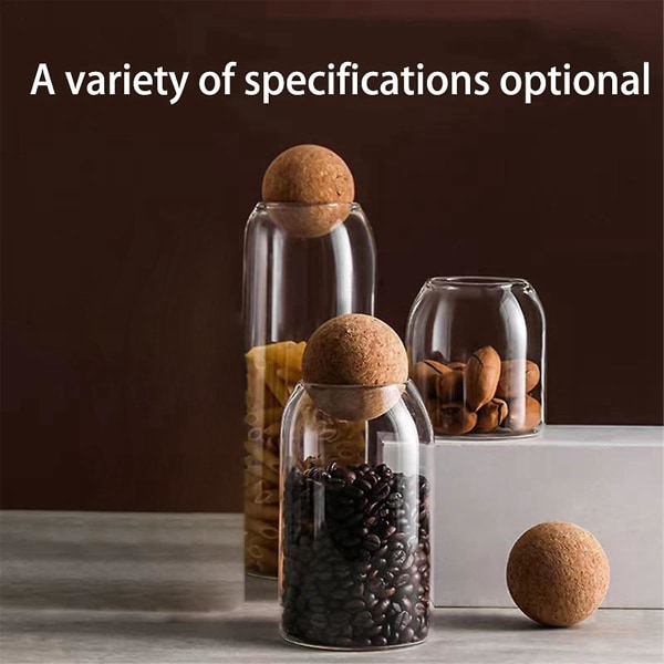 Kirkkaat lasipullot, lasilliset elintarvikkeiden säilytysastiat ilmatiiviillä pyöreällä korkilla, makeisille, pähkinälle, mausteelle, kahvipavulle, 9 x 15 cm