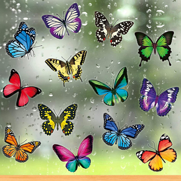 Stora vackra färgglada fjärilar klamrar sig fast vid fönsterklistermärken hjälper till att förhindra fågelst