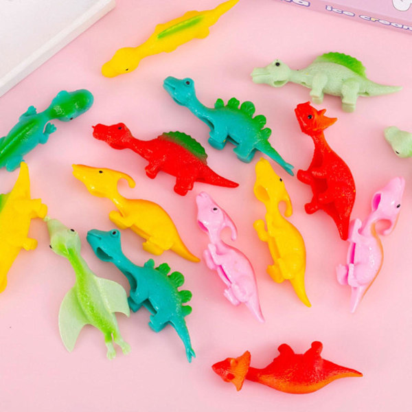 Dinosauruskumiset lentävät lelut Katapulttilelut Hauska kuminen napsauttava lelu Venyvä peli Dinosauruskoulun aktiviteetteihin Fidgets [db] Multicolor Free Size