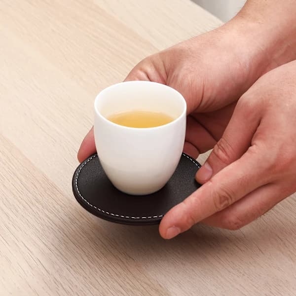 Kaffefarvede 6 stk. runde læderunderlag, PU-læderunderlag