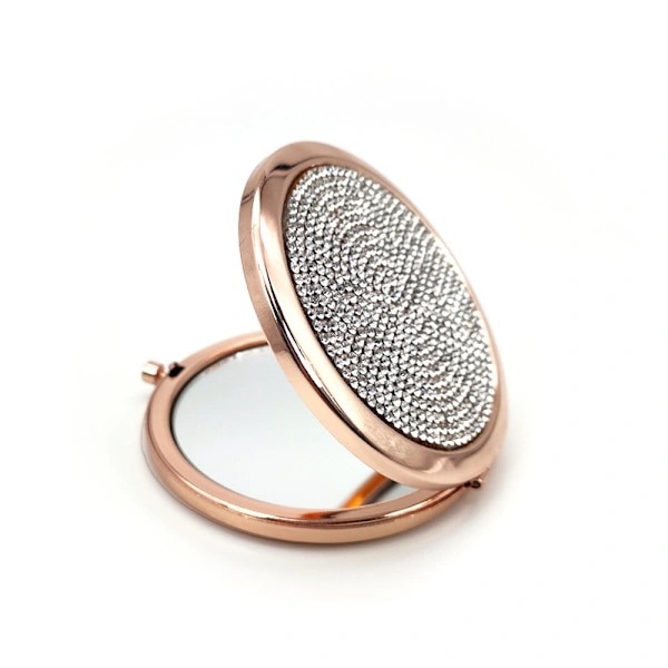 Makeupspejl, til brug ved påføring af makeup.