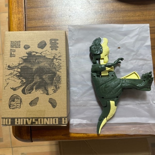 Lapset's Hauskoja leluja Pop Up Painamista Dinosaurukset Puheet Pojat ja tytöt Pää ja häntä Liikkuva Jännittävä dinosaurukset palapeli