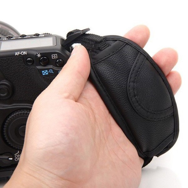 Läder hand grepp handled rem för DSLR kameror passar för Nikon Canon