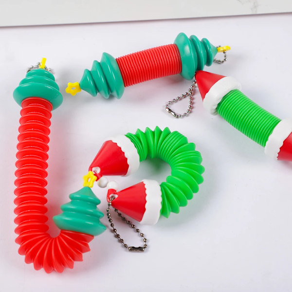 4 kpl joulu kuusi hattu  mini pop putket sensoriset lelut lapsille