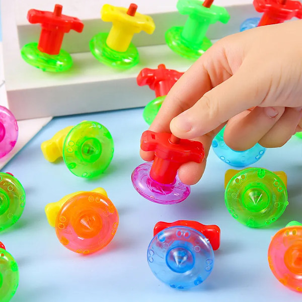 12 bitar Mini Torsion Gyro Spinning Topp Skrivbord leksaker för barn födelsedag fest favoriter