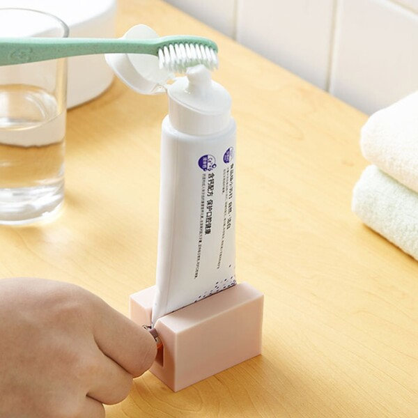 Tandkräm Dispenser Silicon Bottom Rullande Rymd Spara Squeezer