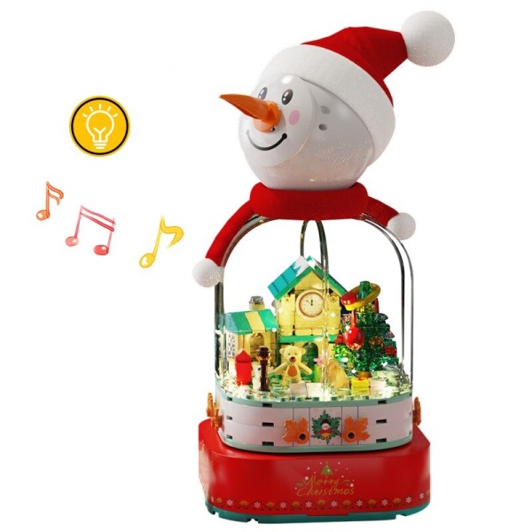 By juletre hus roterende musikk boks bygge blokker venner skinnende snømann figurer med lys klosser leker