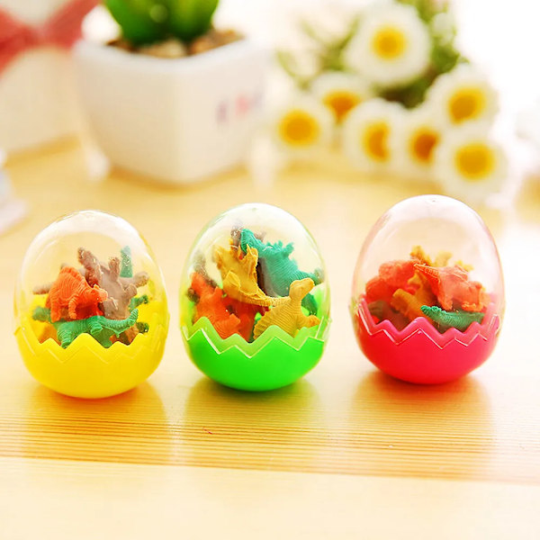 24 Pack Tecknad film Mini Dinosaurie Ägg Radergummi Barn Student Pappersmaterial Priser Födelsedag Fest Fynd väskor