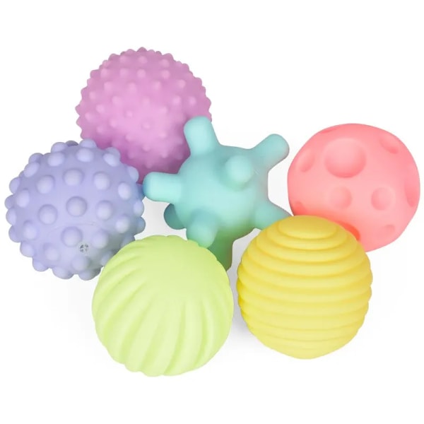 4 delar Set Mjuk Gummi Multi-Texture Baby Grab Ball Leksak Träning Grip Förmåga Hand Grab Bol