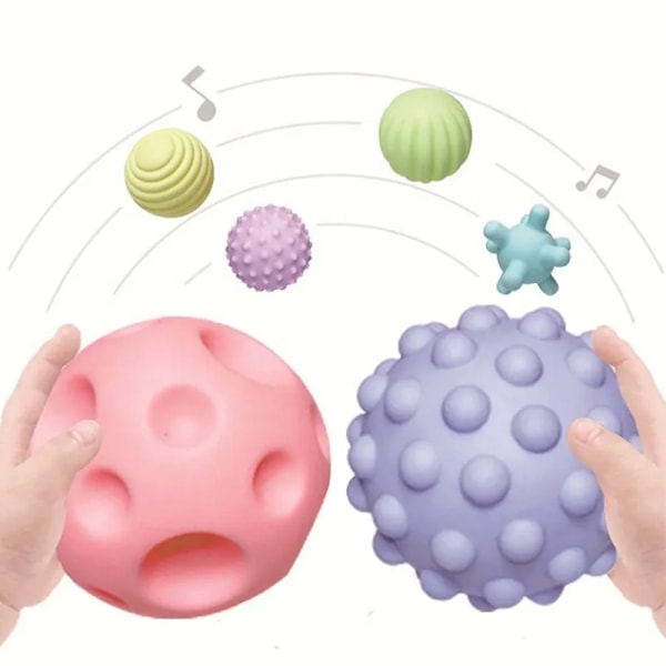 4 delar Set Mjuk Gummi Multi-Texture Baby Grab Ball Leksak Träning Grip Förmåga Hand Grab Bol