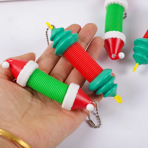 4 kpl joulu kuusi hattu  mini pop putket sensoriset lelut lapsille