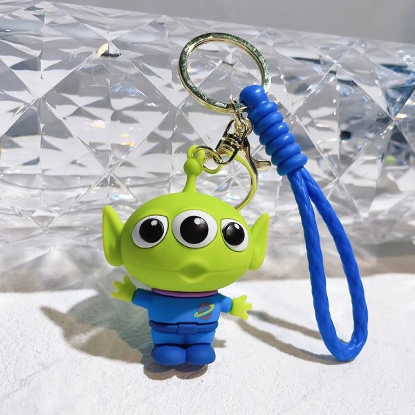 Lelu tarina avaimenperä söpö kolme silmä alien avaimenperä riipus Kawaii Disney laukku tarvikkeet