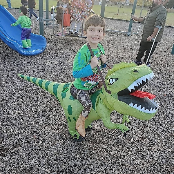 Hauska lapsi aikuinen puhallettava ratsastus vihreä dinosaurus cosplay asu