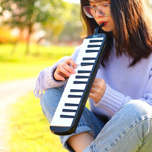 32 koskettimet Melodica piano koskettimet tyyli musiikki instrumentti huuliharppu suu urut kantolaukkulla