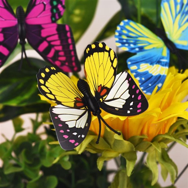 En gjeng sommerfugler Hage Gard Planter Fargerike Snoende Sommerfugl Stakes