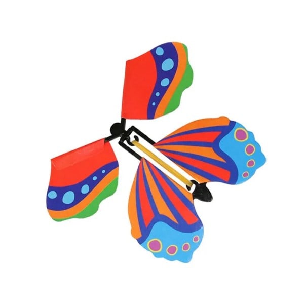 Magic Wind Up Flying Sommerfugl i Book Gummi Band Powered Magic Fairy Flying Legetøj