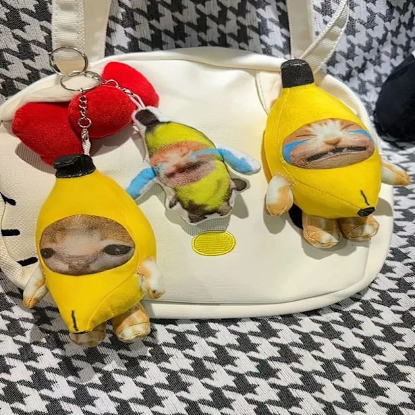 Banan katt docka hänge nyckelring gråter glad banan katt
