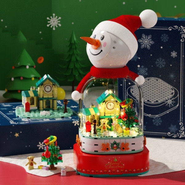 By juletre hus roterende musikk boks bygge blokker venner skinnende snømann figurer med lys klosser leker